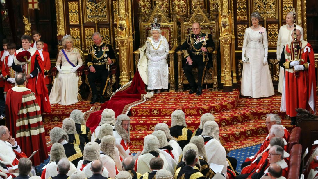 Charles and Camilla, seated at the left near Queen Elizabeth II, attend the opening of Parliament together in May 2013.