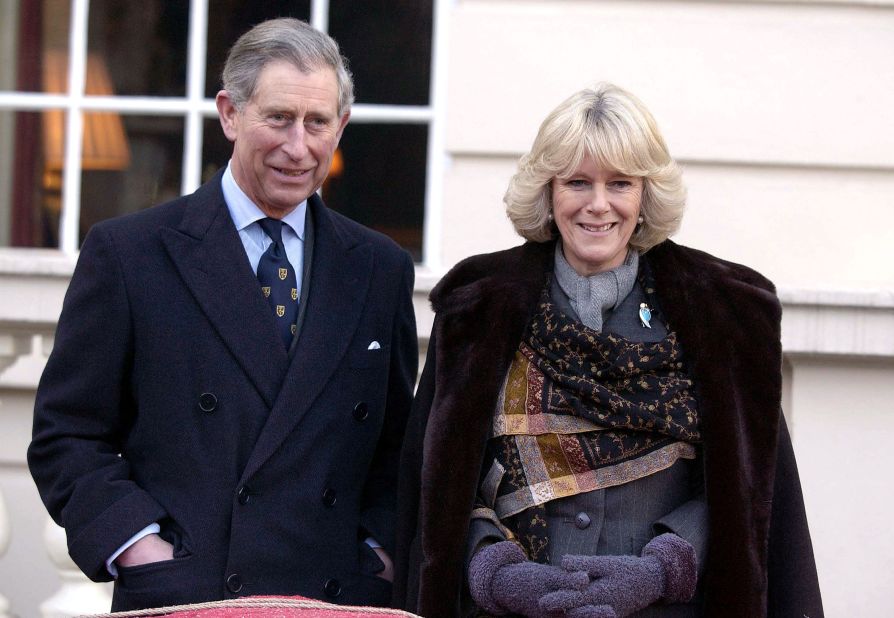 Charles and Camilla walk together in February 2003.