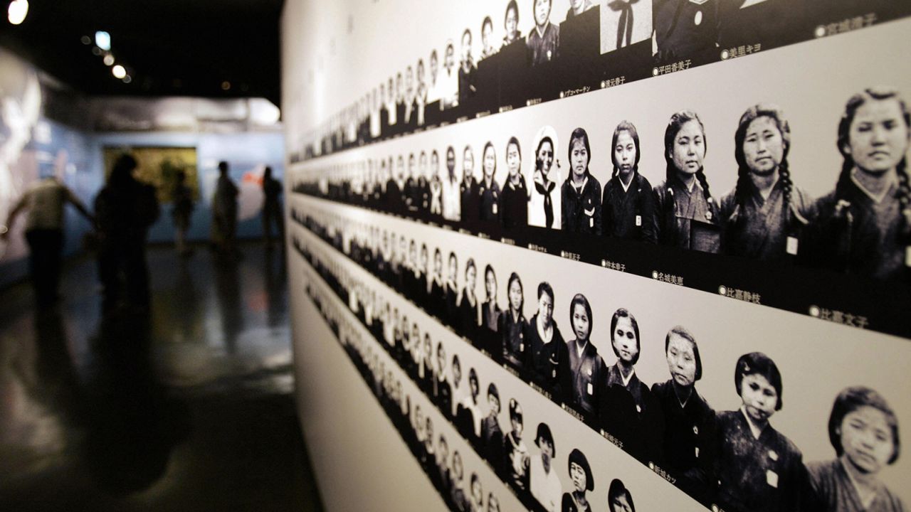 Portraits of members of Himeyuri unit are displayed at the Himeyuri Peace Momorial Museum. 