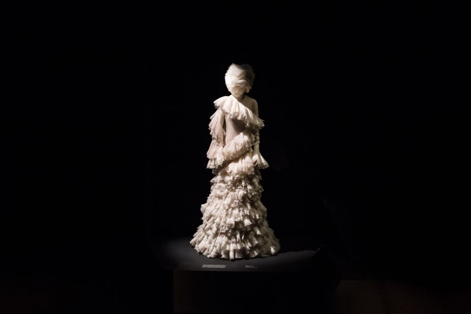 Kate Moss wore this diaphanous dress for the show finale. However, instead of having Kate walk the runway, McQueen projected her dancing hologram into a glass pyramid. (This is recreated in the exhibition.)