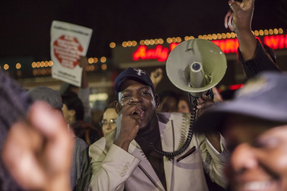 Demonstrators shout slogans during ongoing protests in Ferguson on March 12. Organizers say protests have continued for more than 200 days since Brown's killing.