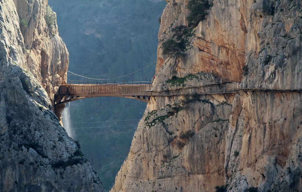 <strong>Caminito del Rey (Malaga, Spain):</strong> The "King's Little Path" features a boardwalk that's built into the side of a cliff face and hangs 100 meters above the Guadalhorce River near the village of El Chorro, near Malaga. 