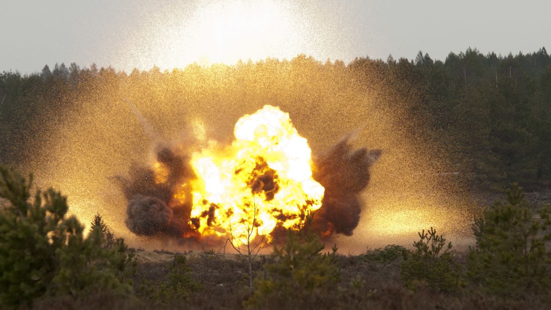 A Bangalore torpedo explodes at a demolition range during a training exercise at Pabrade training area, Lithuania, February 27, 2015. Dragoons of Lightning Troop, 3rd Squadron, 2nd Cavalry Regiment, spent the day learning the process of assembling and detonating makeshift explosives.