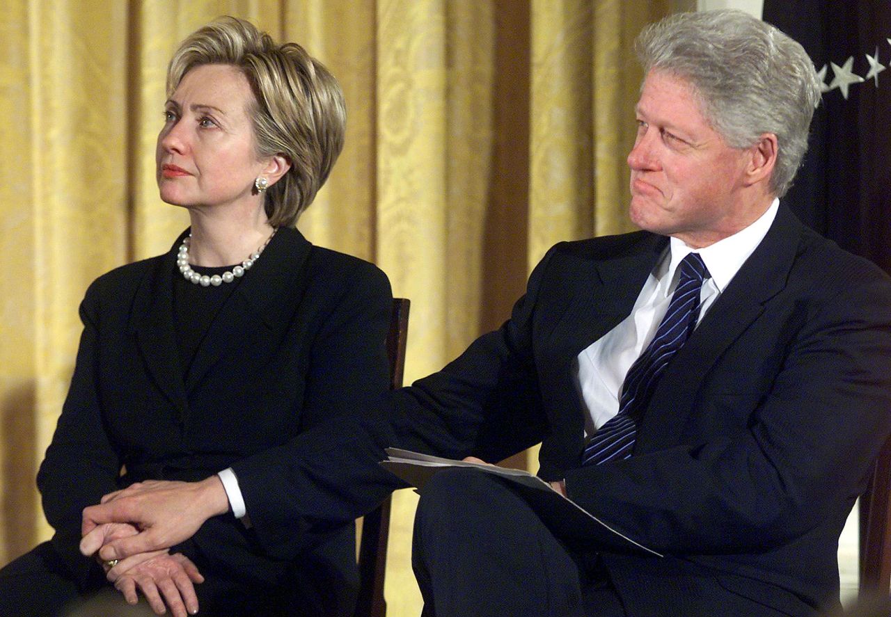 The Clintons at a celebration of the Breast and Cervical Cancer Act of 2000 at the White House on January 4, 2001. Weeks later, on his final day in office, Bill Clinton would pardon an unusually large number of people including fugitive Marc Rich, a move that was dubbed "Pardongate."
