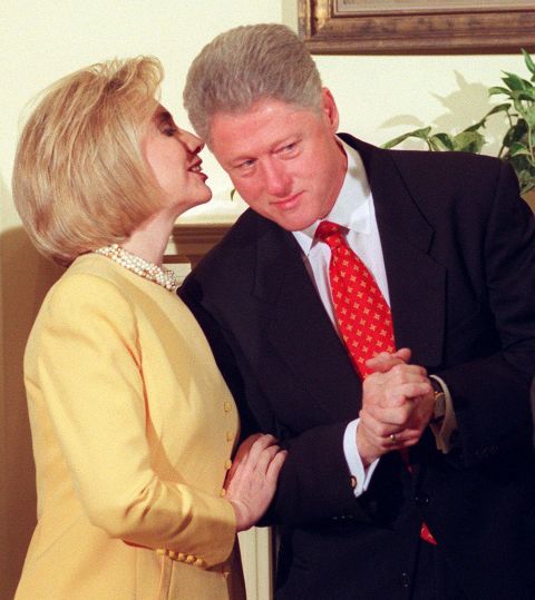 Former President Clinton listens to Hillary during an education event at the White House on January 26, 1998. During the event, Clinton made a statement about his alleged affair with former White House intern Monica Lewinsky. The President vehemently denied the allegations, saying, "I did not have sexual relations with that woman, Miss Lewinsky, I never told anybody to lie, not a single time."