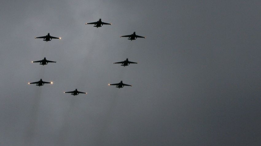 Russian Air Force Su-25 SM attack planes fly during a military drill at Primorkso-Akhtarsk, Krasnodar region, on February 26, 2015.