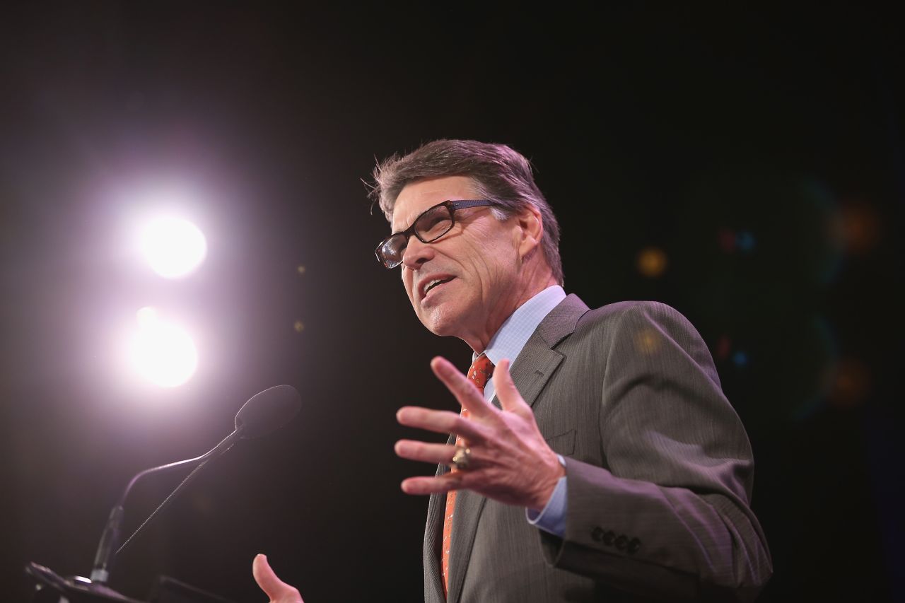 Former Texas Governor Rick Perry speaks to guests at the Iowa Freedom Summit on January 24 in Des Moines, Iowa. The summit is hosting a group of potential 2016 Republican presidential candidates to discuss core conservative principles ahead of the January 2016 Iowa Caucuses.