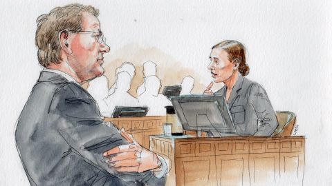 Prosecutor Steve Mellin, left, with Dr. Rene Robinson