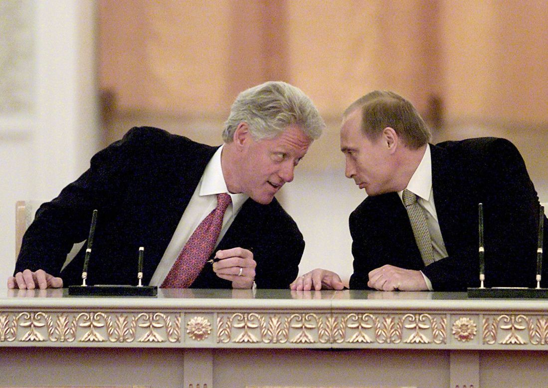 Putin and U.S. President Bill Clinton talk in Moscow in June 2000.