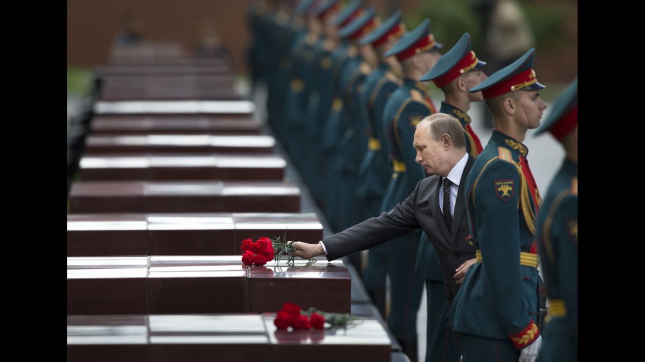 Putin takes part in a wreath-laying ceremony at the Tomb of the Unknown Soldier outside Moscow's Kremlin Wall in June.