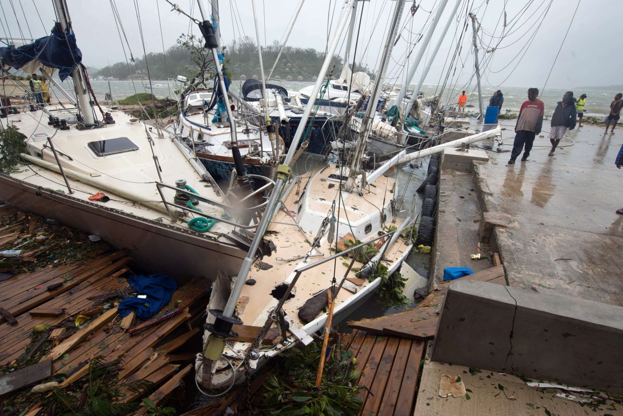 Damaged boats are seen on Saturday, March 14, in Port Vila, Vanuatu's capital.