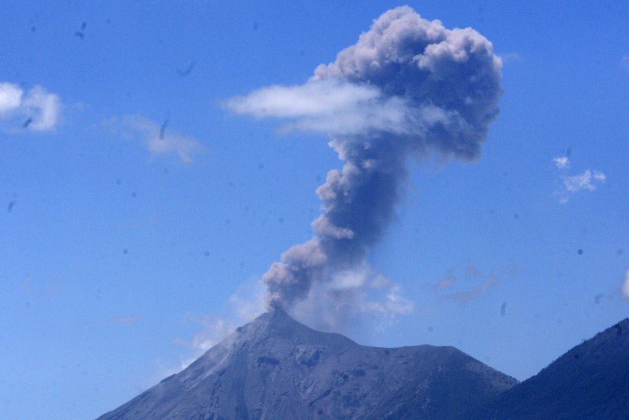 The Fuego volcano spews a cloud of ash west of Guatemala City, Guatemala, in March 2015.