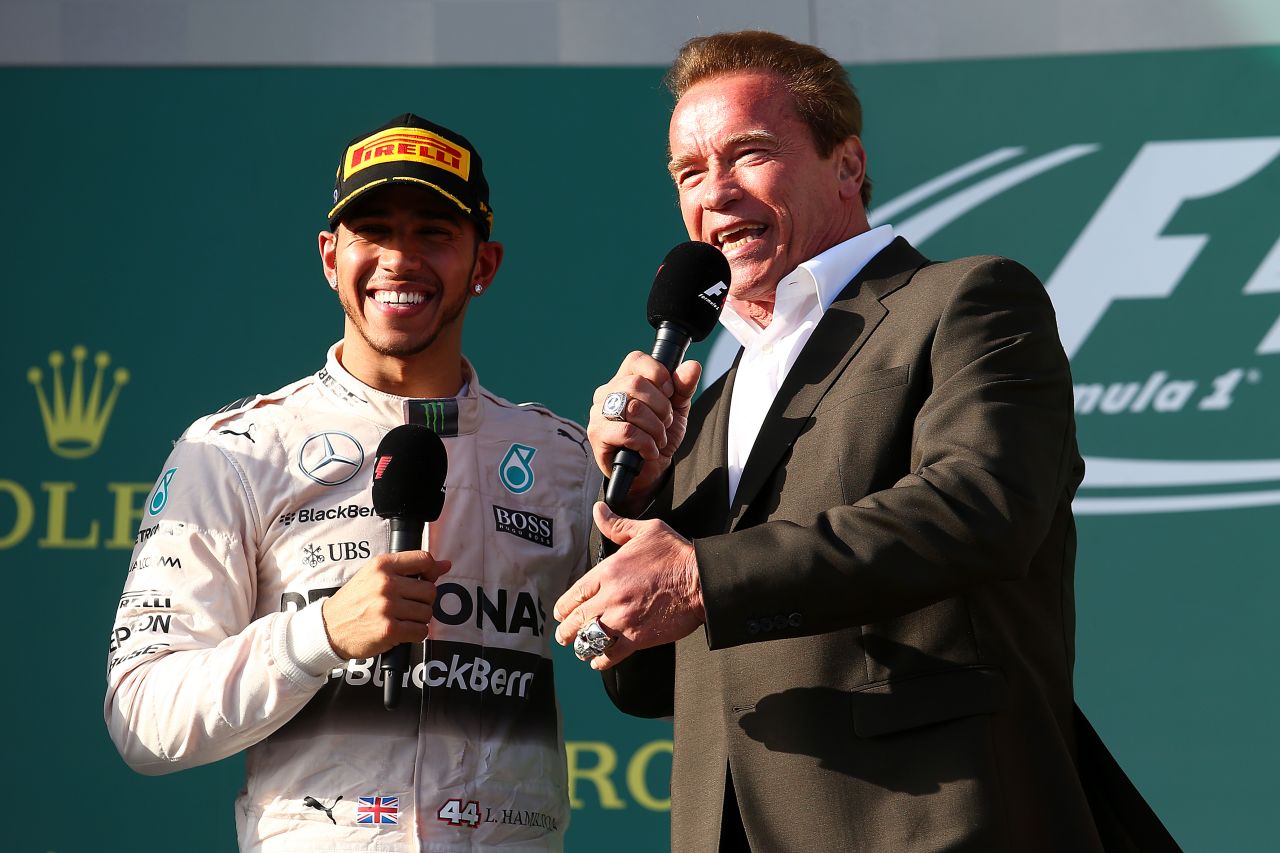 F1 star meets movie star as Lewis Hamilton is interviewed after his Australia GP triumph by Arnold Schwarzenegger.