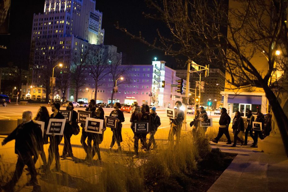 Ferguson activists march through downtown St. Louis during a protest on Saturday, March 14. The Ferguson Police Department has been under fire since one of its officers, Darren Wilson, shot and killed African-American teen Michael Brown in August, and more recently since a scathing U.S. Department of Justice report documented a pattern of racial discrimination. 