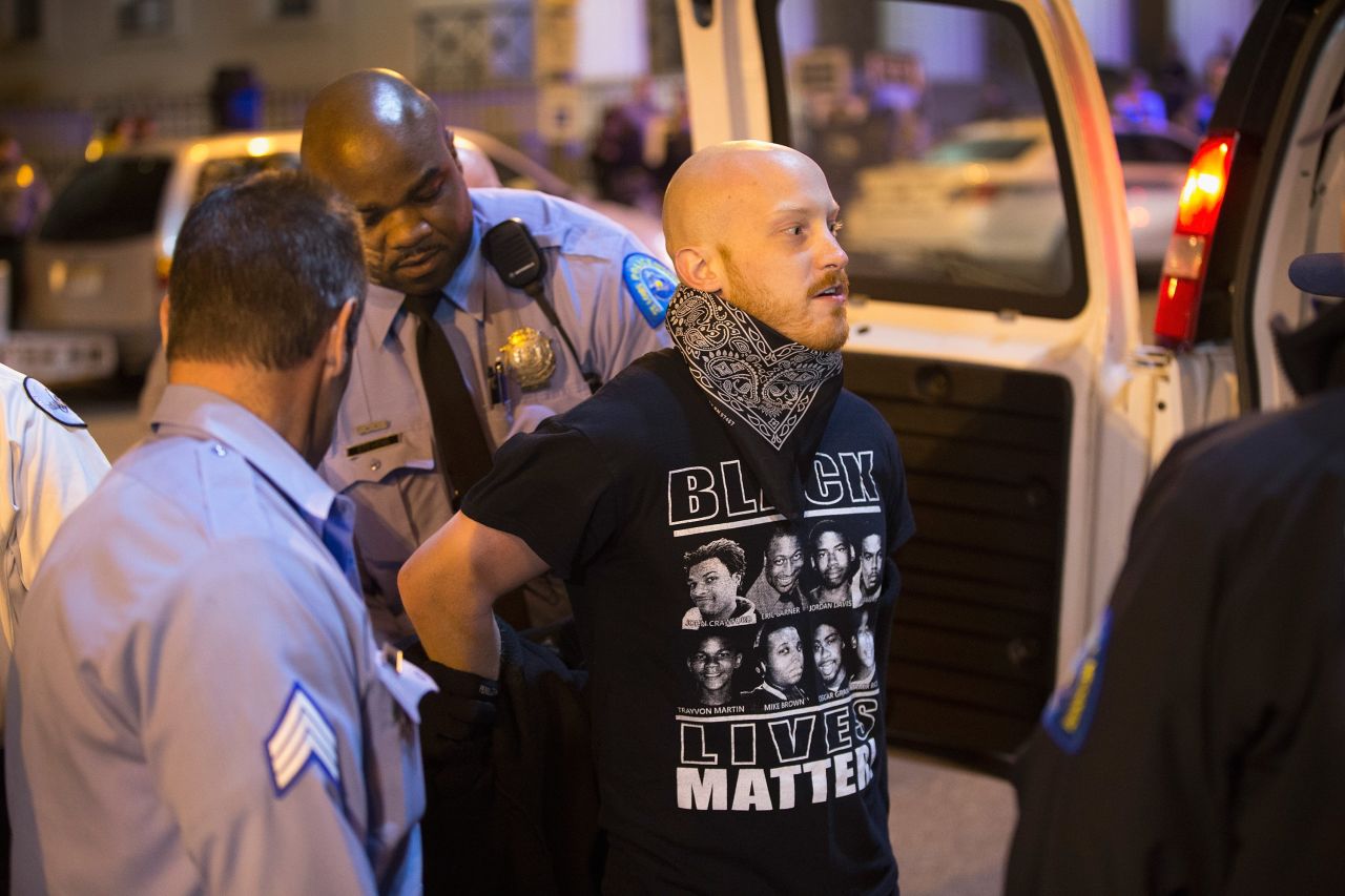St. Louis police arrest a demonstrator in St. Louis on March 14.