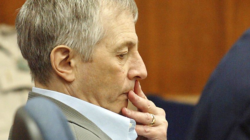 Caption:GALVESTON, TX - NOVEMBER 10: Millionaire murder defendant Robert Durst (C) sits in State District Judge Susan Criss court with his attorney Dick DeGuerin (R) November 10, 2003 at the Galveston County Courthouse in Galveston, Texas. Durst is being charged for the murder and mutilation of his neighbor Morris Black. (Photo by James Nielsen/ Getty Images)