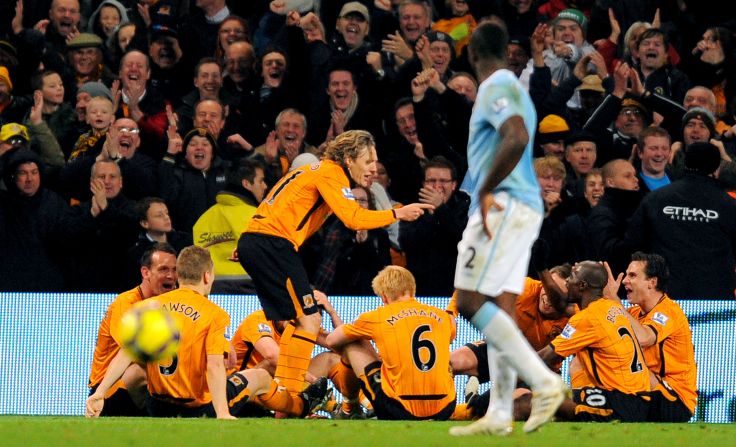 Managers often seem to be the butt of witty goal celebrations japes.<br /><br />Here, Jimmy Bullard of Hull City mockingly tells off his teammates after scoring a penalty against Manchester City in 2009. <br /><br />The midfielder was making light of then Hull manager Phil Brown who, a season before, had been so unimpressed by his side's first half display at the City of Manchester stadium that he carried out his furious halftime team talk on the pitch in full view of fans and cameras.