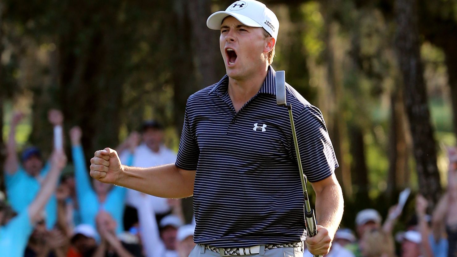 Jordan Spieth celebrates after the 28-foot birdie putt that gave him victory on the third playoff hole.
