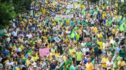 Demonstrators rally to protest against the government of president Dilma Rousseff in Porto Alegre, Brazil on 15 March, 2015. Tens of thousands of Brazilians turned out for demonstrations Sundays to oppose leftist president Dilma Rousseff, a target of rising discontent amid a faltering economy and a massive corruption scandal at state oil giant Petrobras.