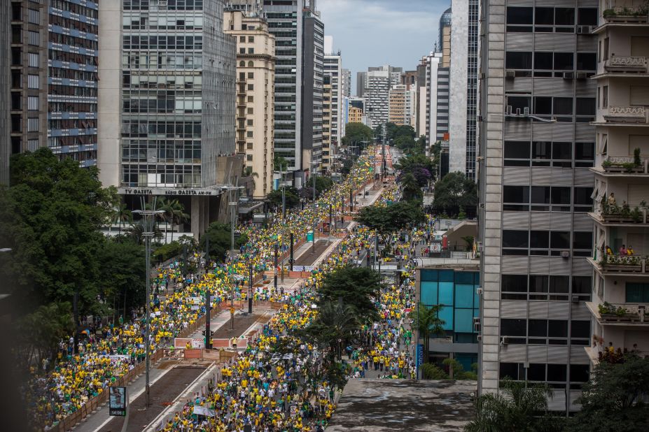 Demonstrators protest along Paulista Avenue.