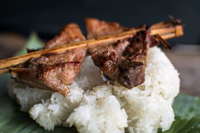 "We have developed an addiction to sticky rice," says the traveling couple. "A staple in Laos, it is so much better than normal rice -- especially because you get to eat it with your hands. Topped with a skewer of caramel grilled pork chop or pickled veggies, getting your hands dirty is the best way to consume it."