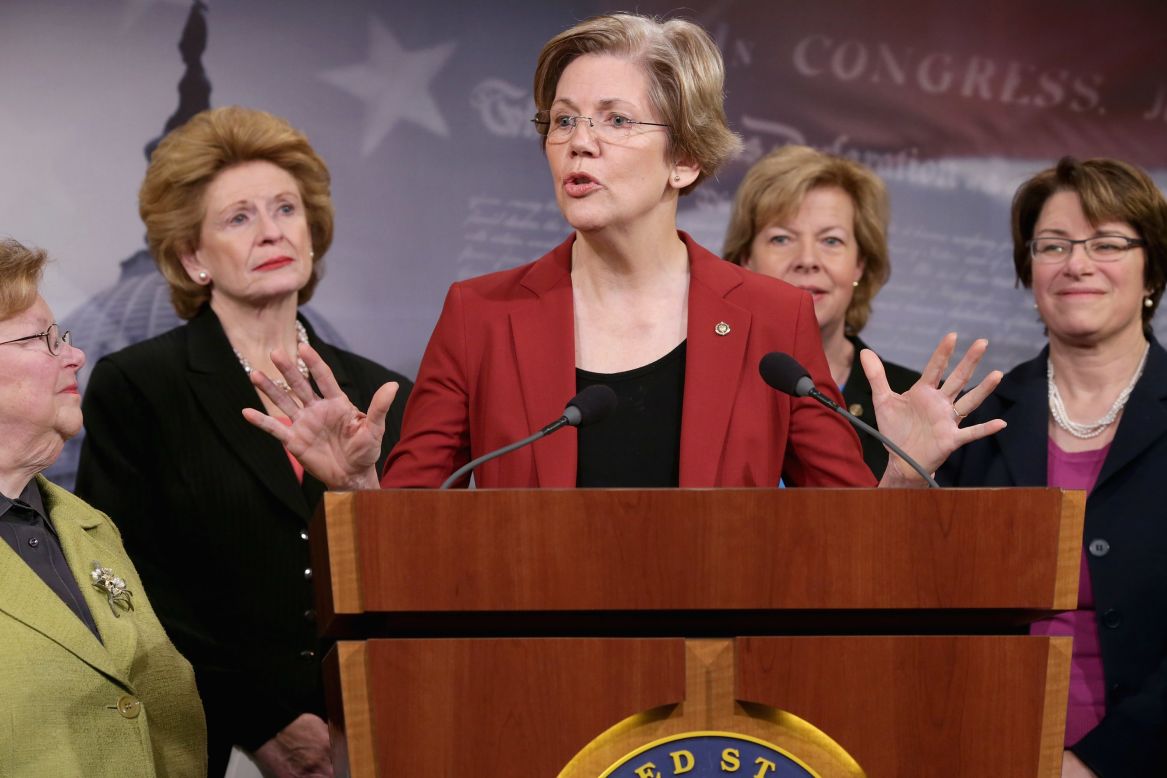 Democratic Senators Barabara Mikulski, Debbie Stabenow, Warren, Tammy Baldwin and Amy Klobuchar at a news conference to announce their support for raising the minimum wage to $10.10 at the U.S. Capitol on January 30, 2014.