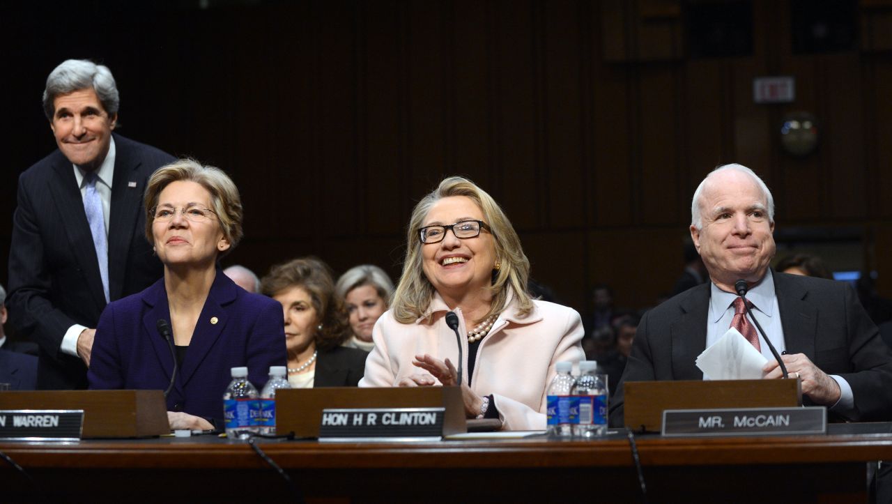 (Left to right): John Kerry, Warren, then-Secretary of State Hillary Clinton and Sen. John McCain, are seated at Kerry's State Department confirmation hearings on Capitol Hill on January 24, 2013.