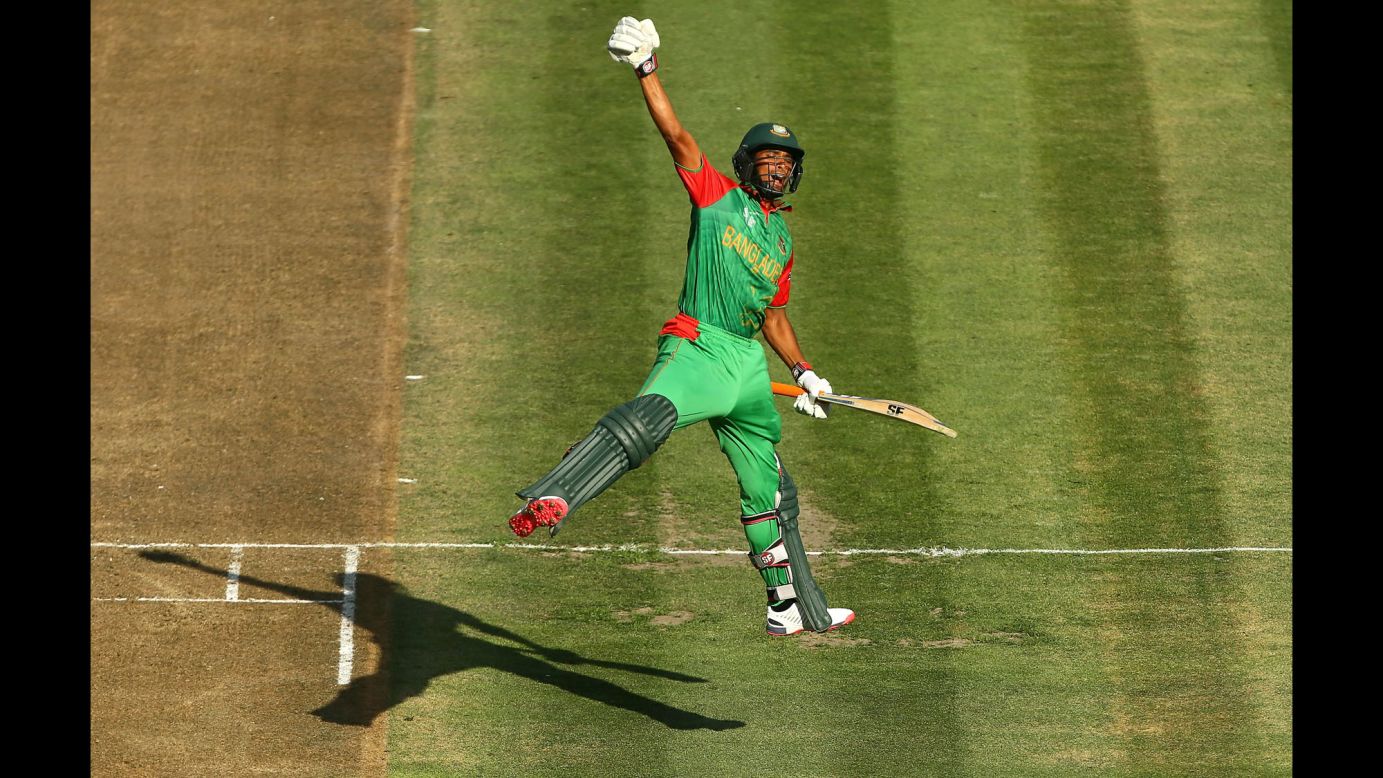 Bangladesh's Mahmudullah Riyad celebrates scoring a century during a Cricket World Cup match against New Zealand on Friday, March 13. New Zealand, one of the tournament's co-hosts, won the match by three wickets, but both teams advanced to the knockout stage.