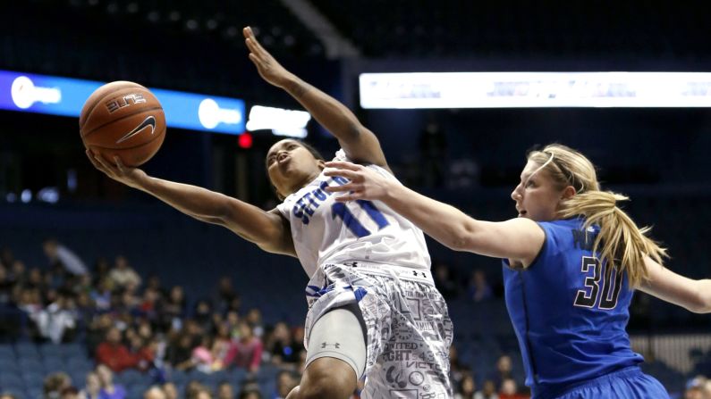 Seton Hall guard Ka-Deidre Simmons drives past DePaul forward Megan Podkowa during the final of the Big East tournament Tuesday, March 10, in Rosemont, Illinois. DePaul won the game 78-68.