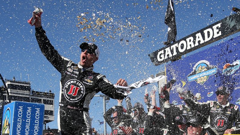 Confetti flies as NASCAR driver Kevin Harvick and his crew soak in a Sprint Cup victory Sunday, March 15, at Phoenix International Raceway.