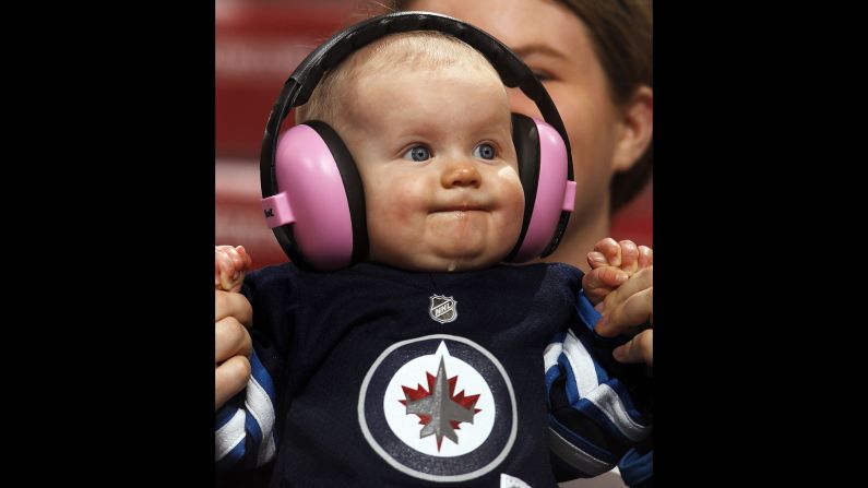 A young Winnipeg Jets fan watches the action during an NHL game in Sunrise, Florida, on Thursday, March 12.