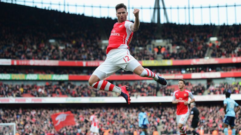 Arsenal forward Olivier Giroud pumps his fist after scoring the opening goal in a 3-0 home victory over West Ham on Saturday, March 14. Both Premier League teams play in London.