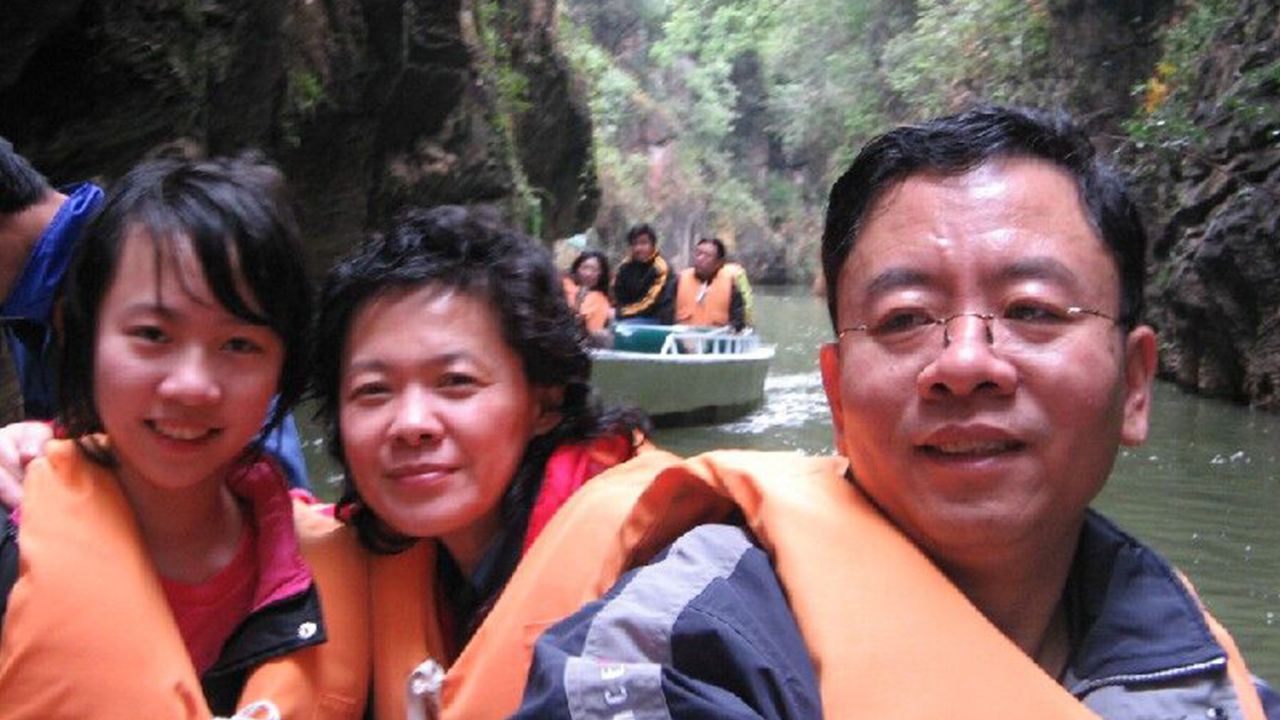 Tong Shao vacations with her mother and father in 2007. Her father says the trip remains his favorite memory.