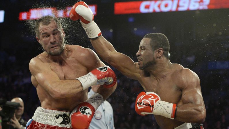 Jean Pascal punches Sergey Kovalev during their light-heavyweight title bout Saturday, March 14, in Montreal. But Kovalev retained his belts with an eighth-round TKO.