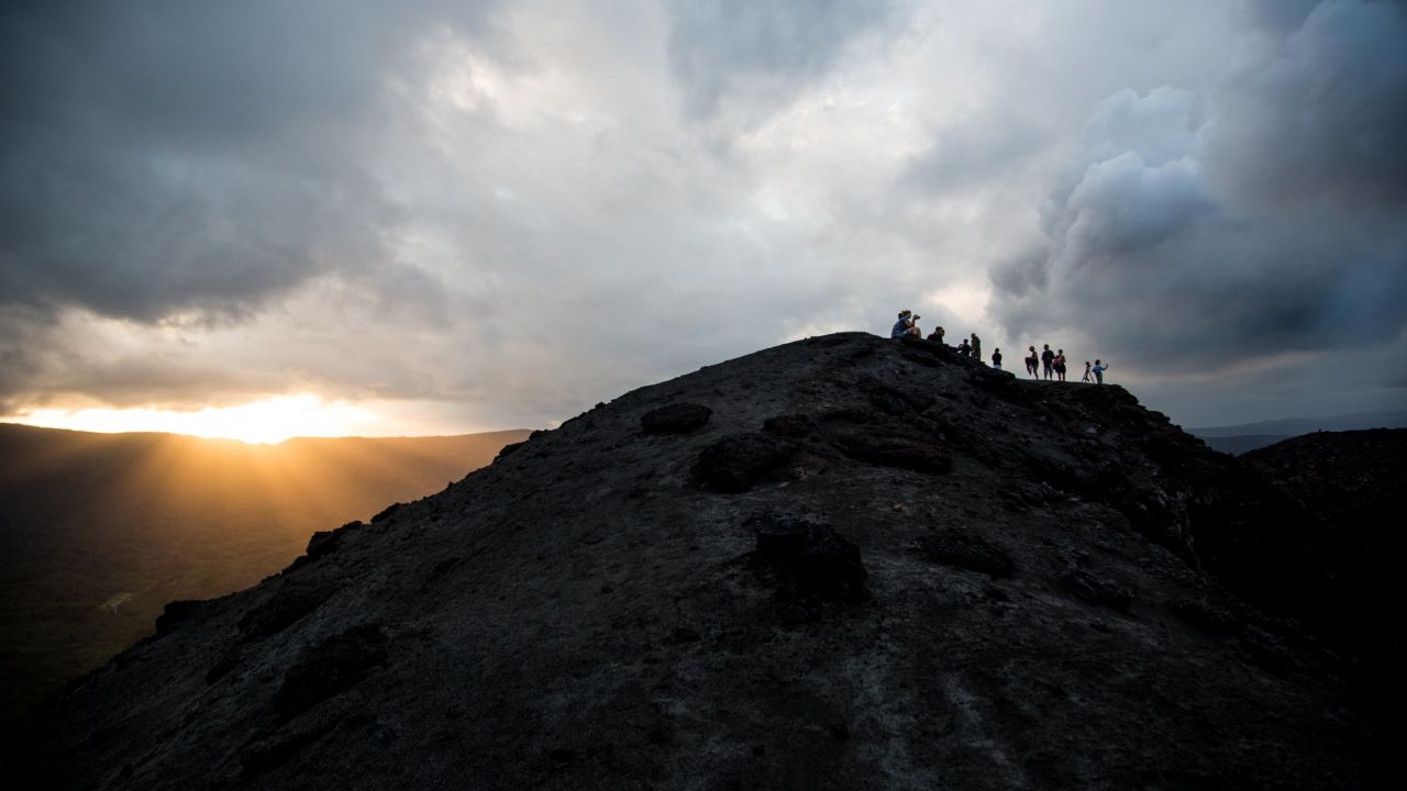 Light filters through clouds over Vanua Lava, at sunset.

