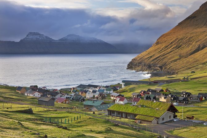 On the northeast corner of Eysturoy, the village of <a  target="_blank" target="_blank">Gjogv</a> is home to fewer than 50 inhabitants. Much attention has gone into preserving the traditional red, white and green Faroese building design.