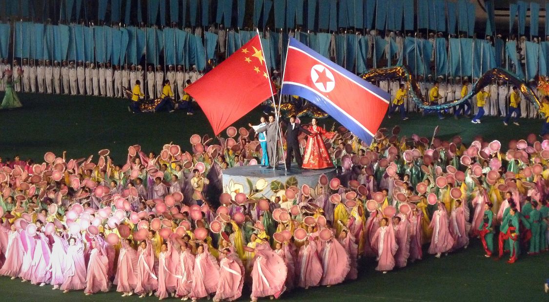 North Korea's mass games, the annual spectacle, regularly features the flags of both North Korea and China. The two countries have been longtime historic allies since China came to the aid of North Koreans during the Korean War. However, some observers believe relations between the two nations have cooled recently. 