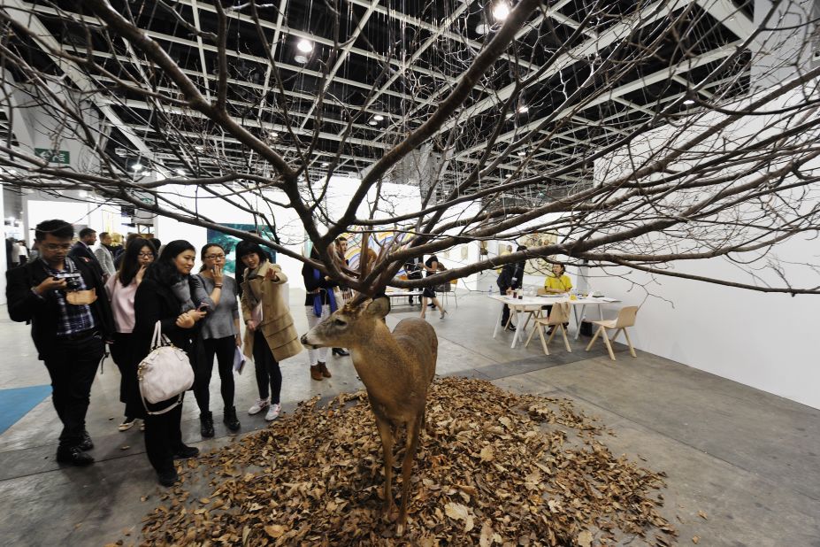 The lines between reality and make-believe are blurred in Kim Myeongbeom's sculpture of a taxidermied deer sprouting tree branches.  