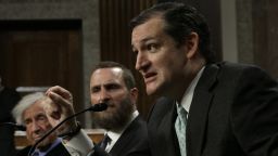 Nobel Peace Laureate Elie Wiesel (left) listens as Sen. Ted Cruz (right) (R-TX) speaks during a roundtable discussion on Capitol Hill March 2, 2015 in Washington, D.C. Wiesel, Cruz and Rabbi Scmuley Boteach (center) participated in a discussion entitled 'The Meaning of Never Again: Guarding Against a Nuclear Iran.'