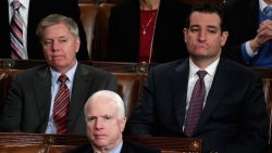 (Left to right) U.S. Sen. Lindsey Graham (R-SC), U.S. Sen. John McCain (R-AZ) and U.S. Sen. Ted Cruz (R-TX) listen as U.S. President Barack Obama delivers the State of the Union address to a joint session of Congress in the House Chamber at the U.S. Capitol on January 28, 2014 in Washington, D.C.