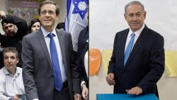 Israeli Labour Party leader and co-leader of the Zionist Union list for the upcoming general election, Isaac Herzog (L), casts his ballot near his wife Michal (C), in Tel Aviv on March 17, 2015.  Voting polls opened for unpredictable elections to determine whether Israelis still want incumbent Prime Minister Benjamin Netanyahu as leader, or will seek change after six years.  AFP PHOTO / THOMAS COEX        (Photo credit should read THOMAS COEX/AFP/Getty Images)

Israeli Prime Minister Benjamin Netanyahu casts his vote during Israel's parliamentary elections in Jerusalem, Tuesday, Mar. 17, 2015. Israelis are voting in early parliament elections following a campaign focused on economic issues such as the high cost of living, rather than fears of a nuclear Iran or the Israeli-Arab conflict. (AP Photo/Sebastian Scheiner, Pool)