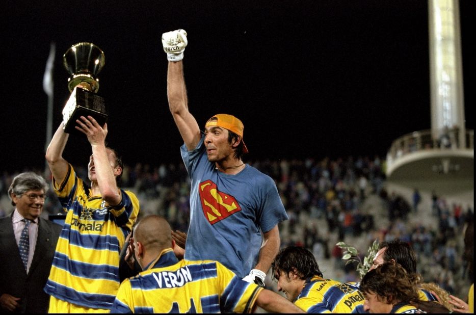 Former Parma goalkeeper Gianluigi Buffon celebrates victory in the 1999 Coppa Italia Cup Final match against Fiorentina. Buffon went on to win the World Cup with Italy in 2006 and is considered one of the greatest goalkeepers in history. 