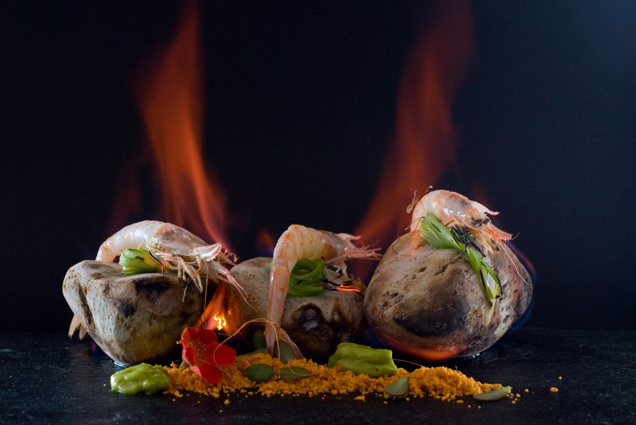 The Spanish prawns are flambeed at your table over lava rocks with "orujo," a Spanish spirit similar to grappa.