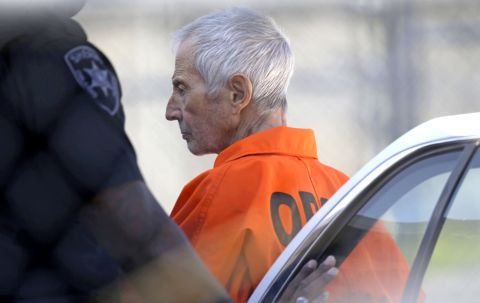 Robert Durst, a wealthy New York real-estate heir, is escorted into Orleans Parish Prison after his arraignment in New Orleans on Tuesday, March 17. Durst faces felony firearm and drug charges in New Orleans, and he has been charged with first-degree murder in Los Angeles. Investigators say they believe Durst, 71, was behind the slaying of Susan Berman, Durst's longtime friend. Durst is also the focus of the HBO documentary series "The Jinx," which explores his wife's 1982 disappearance and investigators' suspicions that Berman was killed because she knew what happened to her. Durst has long maintained he didn't kill Berman or have anything to do with his wife's disappearance.