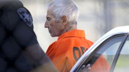 Robert Durst is escorted into Orleans Parish Prison after his arraignment in Orleans Parish Criminal District Court in New Orleans, Tuesday.