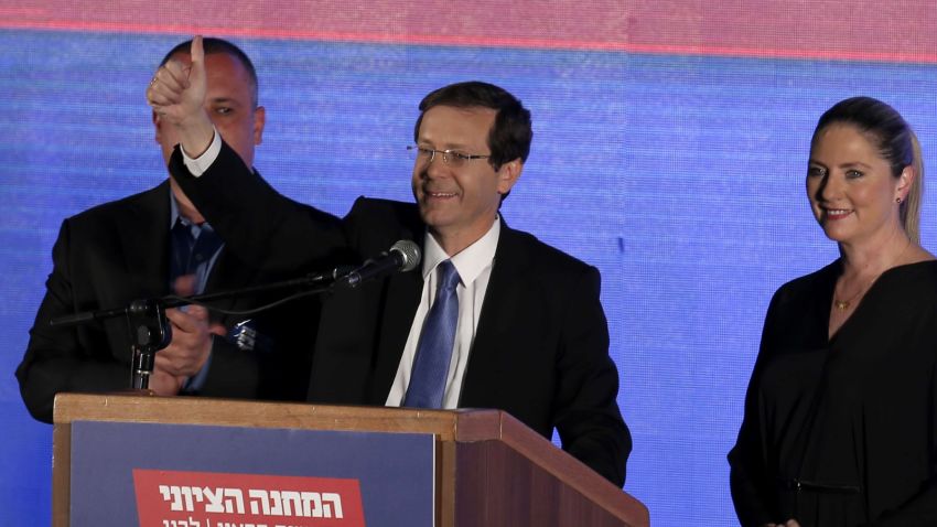 Co-leader of the Zionist Union party, Israeli Labour Party leader Isaac Herzog (C), delivers a speech as he reacts to exit poll figures in Israel's parliamentary elections late on March 17, 2015 in the city of Tel Aviv. Israeli Prime Minister Benjamin Netanyahu's rightwing Likud party is neck-and-neck with the centre-left Zionist Union, exit polls say. AFP PHOTO / THOMAS COEXTHOMAS COEX/AFP/Getty Images