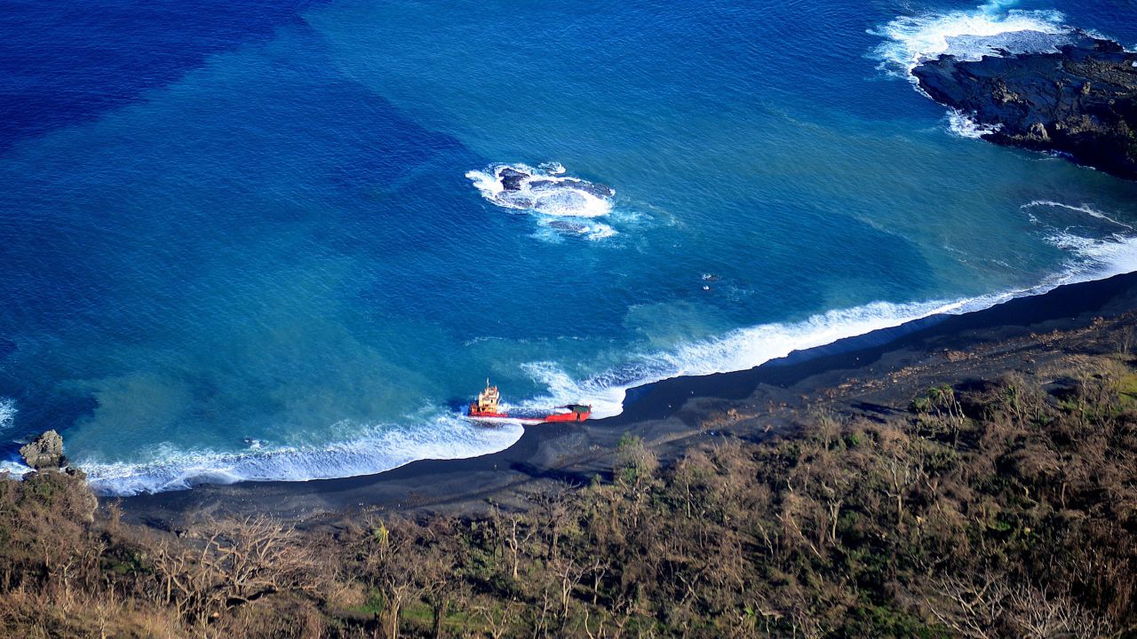 A ship sits beached along the shore of Tanna on March 18.