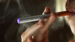 An e-cigarette made to look like a traditional tobacco cigarette, popular among the first generation of electronic converts. The battery powered device heats "e-liquid", containing nicotine, which is released in aerosol form.