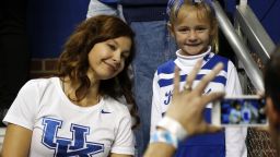 Actress Ashley Judd, left, poses with a young fan after an NCAA college basketball game between Florida and Kentucky, Saturday, March 7, 2015, in Lexington, Ky. Kentucky won 67-50. (AP Photo/James Crisp)