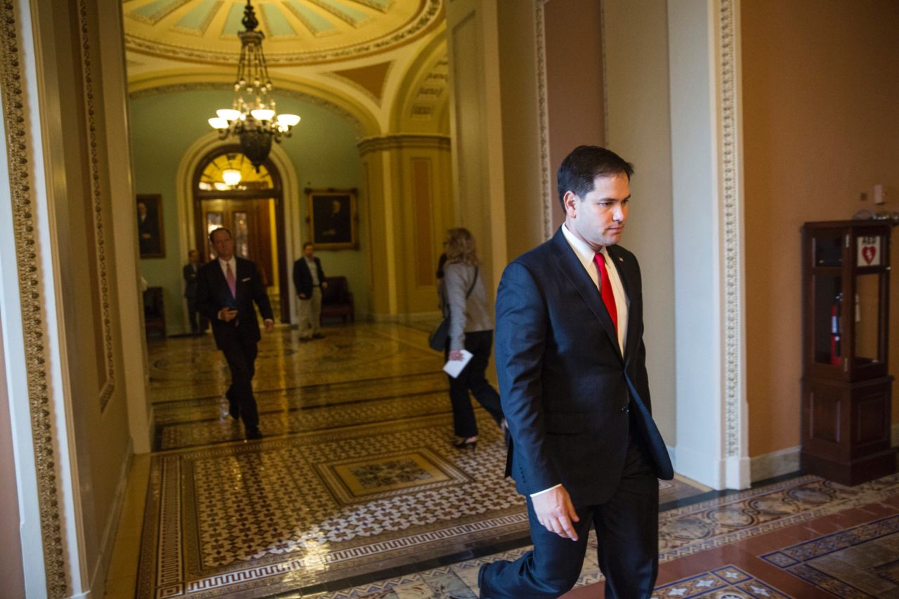 Rubio returns to the Capitol after meeting with Obama and other Republican leaders about the government shutdown in October 2013.